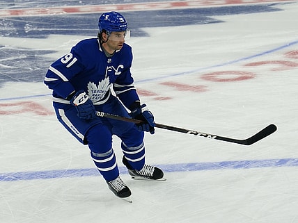 May 20, 2021; Toronto, Ontario, CAN; Toronto Maple Leafs forward John Tavares (91) during the warm up before the game against the Montreal Canadiens before game one of the first round of the 2021 Stanley Cup Playoffs at Scotiabank Arena. Mandatory Credit: John E. Sokolowski-USA TODAY Sports
