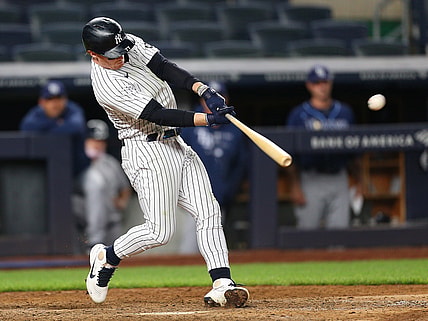 Jun 1, 2021; Bronx, New York, USA; New York Yankees right fielder Clint Frazier (77) hits a walk off game winning two run home run against the Tampa Bay Rays during the eleventh inning at Yankee Stadium. Mandatory Credit: Andy Marlin-USA TODAY Sports