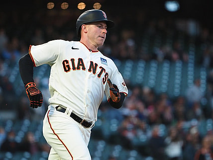 Jun 3, 2021; San Francisco, California, USA; San Francisco Giants starting pitcher Anthony DeSclafani (26) rounds first base for an RBI double against the Chicago Cubs during the fourth inning at Oracle Park. Mandatory Credit: Kelley L Cox-USA TODAY Sports