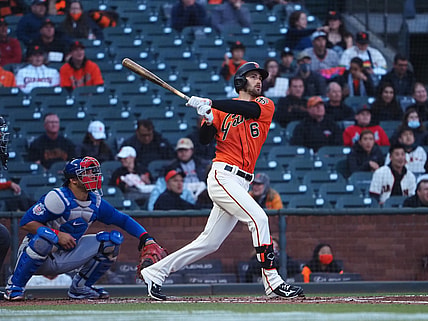 Jun 4, 2021; San Francisco, California, USA; San Francisco Giants center fielder Steven Duggar (6) hits a two-run home run ahead of Chicago Cubs catcher Willson Contreras (40) during the second inning at Oracle Park. Mandatory Credit: Kelley L Cox-USA TODAY Sports