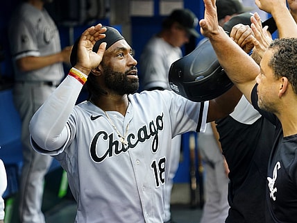 Aug 24, 2021; Toronto, Ontario, CAN; Chicago White Sox right fielder Brian Goodwin (18) celebrates scoring against the Toronto Blue Jays during the first inning at Rogers Centre. Mandatory Credit: John E. Sokolowski-USA TODAY Sports
