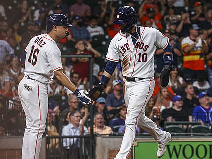 Aug 24, 2021; Houston, Texas, USA; Houston Astros first baseman Yuli Gurriel (10) celebrates with third baseman Aledmys Diaz (16) after scoring a run against the Kansas City Royals during the third inning at Minute Maid Park. Mandatory Credit: Troy Taormina-USA TODAY Sports