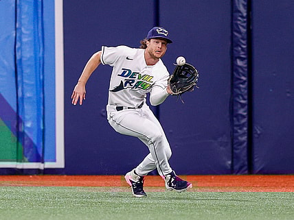 Sep 25, 2021; St. Petersburg, Florida, USA;  Tampa Bay Rays right fielder Brett Phillips (35) fields the ball in the second inning against the Miami Marlins at Tropicana Field. Mandatory Credit: Nathan Ray Seebeck-USA TODAY Sports