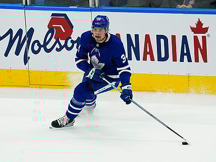 May 20, 2021; Toronto, Ontario, CAN; Toronto Maple Leafs forward Auston Matthews (34) carries the puck against the Montreal Canadiens during the first period of game one of the first round of the 2021 Stanley Cup Playoffs at Scotiabank Arena. Mandatory Credit: John E. Sokolowski-USA TODAY Sports