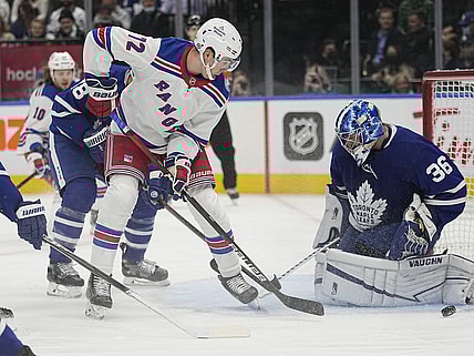 Oct 18, 2021; Toronto, Ontario, CAN; New York Rangers forward Filip Chytil (72) shoots the puck at Toronto Maple Leafs goaltender Jack Campbell (36) during the first period at Scotiabank Arena. Mandatory Credit: John E. Sokolowski-USA TODAY Sports