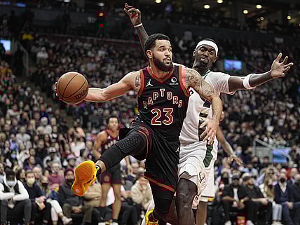 Dec 2, 2021; Toronto, Ontario, CAN; Toronto Raptors guard Fred VanVleet (23) passes the ball as Milwaukee Bucks center Bobby Portis (9) defends during the second quarter at Scotiabank Arena. Mandatory Credit: John E. Sokolowski-USA TODAY Sports