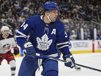Dec 7, 2021; Toronto, Ontario, CAN; Toronto Maple Leafs forward Auston Matthews (34) follows the play against the Columbus Blue Jackets during the third period at Scotiabank Arena. Mandatory Credit: John E. Sokolowski-USA TODAY Sports