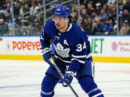 Mar 27, 2022; Toronto, Ontario, CAN; Toronto Maple Leafs forward Auston Matthews (34) looks for a pass against the Florida Panthers at Scotiabank Arena. Mandatory Credit: John E. Sokolowski-USA TODAY Sports