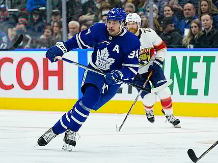 Mar 27, 2022; Toronto, Ontario, CAN; Toronto Maple Leafs forward Auston Matthews (34) skates against the Florida Panthers at Scotiabank Arena. Mandatory Credit: John E. Sokolowski-USA TODAY Sports