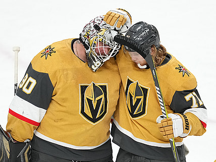 Apr 9, 2022; Las Vegas, Nevada, USA; Vegas Golden Knights center William Karlsson (71) congratulates goaltender Robin Lehner (90) after defeating the Arizona Coyotes at T-Mobile Arena. Mandatory Credit: Stephen R. Sylvanie-USA TODAY Sports