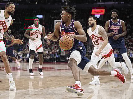 Apr 20, 2022; Toronto, Ontario, CAN; Philadelphia 76ers guard Tyrese Maxey (0) dribbles to the basket past Toronto Raptors guard Fred VanVleet (23) during the first half of game three of the first round for the 2022 NBA playoffs at Scotiabank Arena. Mandatory Credit: John E. Sokolowski-USA TODAY Sports