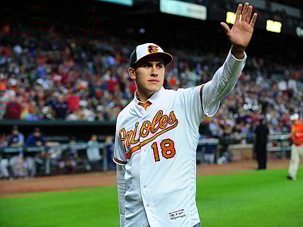 Jun 12, 2018; Baltimore, MD, USA; Baltimore Orioles first round draft pick Grayson Rodriguez (18) waves to the crowd after being introduced during the game against the Boston Red Sox at Oriole Park at Camden Yards. Mandatory Credit: Evan Habeeb-USA TODAY Sports