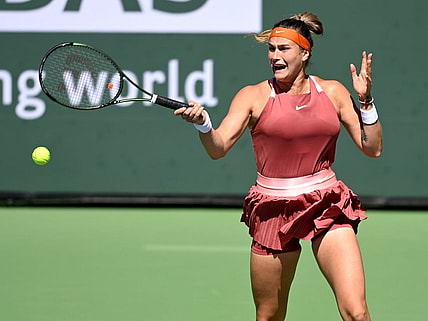 Mar 12, 2022; Indian Wells, CA, USA; Aryana Sabalenka (BEL) hits a shot in her 2nd round match against Jasmine Paolini (ITA) at the BNP Paribas open at the Indian Wells Tennis Garden. Mandatory Credit: Jayne Kamin-Oncea-USA TODAY Sports