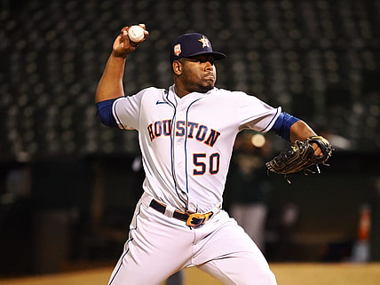 May 31, 2022; Oakland, California, USA; Houston Astros relief pitcher Hector Neris (50) pitches the ball against the Oakland Athletics during the eighth inning at RingCentral Coliseum. Mandatory Credit: Kelley L Cox-USA TODAY Sports