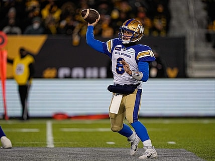 Dec 12, 2021; Hamilton, Ontario, CAN; Winnipeg Blue Bombers quarterback Zach Collaros (8) throws a pass against the Hamilton Tiger-Cats during the 108th Grey Cup football game at Tim Hortons Field. Mandatory Credit: John E. Sokolowski-USA TODAY Sports