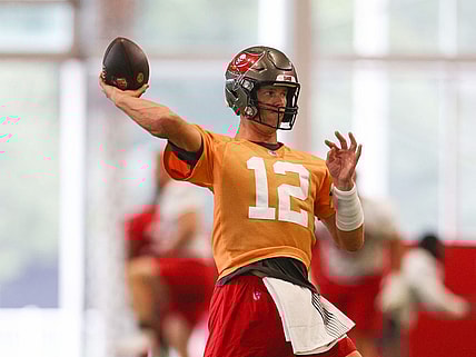 Jun 9, 2022; Tampa, FL, USA;  Tampa Bay Buccaneers quarterback Tom Brady (12) participates in mandatory mini camp at AdventHealth Training Center Mandatory Credit: Nathan Ray Seebeck-USA TODAY Sports