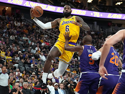 Oct 5, 2022; Las Vegas, Nevada, USA; Los Angeles Lakers forward LeBron James (6) shoots against Phoenix Suns guard Chris Paul (3) during a preseason game at T-Mobile Arena. Mandatory Credit: Stephen R. Sylvanie-USA TODAY Sports