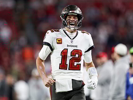 Jan 16, 2023; Tampa, Florida, USA; Tampa Bay Buccaneers quarterback Tom Brady (12) takes the field before a wild card game against the Dallas Cowboys at Raymond James Stadium. Mandatory Credit: Nathan Ray Seebeck-USA TODAY Sports