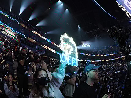 Nov 5, 2022; San Francisco, California, USA; A fan holds a sign for DRX bot laner Kim "Deft" Hyuk-kyu (not pictured) after winning the League of Legends World Championships against T1 at Chase Center. Mandatory Credit: Kelley L Cox-USA TODAY Sports