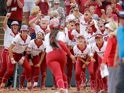 Oklahoma celebrates the home run of Oklahoma's Cydney Sanders (1) in the fourth inning during the NCAA Norman Super Regional softball game between the University of Oklahoma Sooners and the Clemson Tigers at Marita Hynes Field in Norman, Okla., Friday, May, 26, 2023.