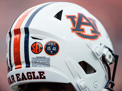 A decal on Auburn helmets honoring the University of Virginia players killed earlier this week that were killed as Auburn Tigers take on Western Kentucky Hilltoppers at Jordan-Hare Stadium in Auburn, Ala., on Saturday, Nov. 19, 2022.