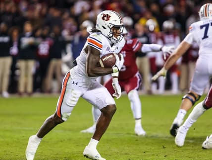 Nov 20, 2021; Columbia, South Carolina, USA; Auburn Tigers running back Tank Bigsby (4) rushes against the South Carolina Gamecocks in the third quarter at Williams-Brice Stadium. Mandatory Credit: Jeff Blake-USA TODAY Sports