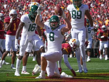 Sep 24, 2022; Ames, Iowa, USA; Baylor tight end Ben Sims (8) scores a touchdown in the first quarter against Iowa State at Jack Trice Stadium. Mandatory Credit: Bryon Houlgrave/Des Moines Register-USA TODAY Sports