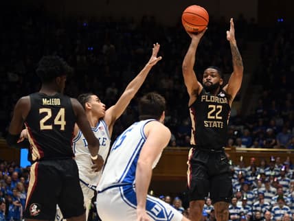Dec 31, 2022; Durham, North Carolina, USA; Florida State Seminoles guard Darin Green Jr. (22) shoots as Duke Blue Devils guard Tyrese Proctor(5) defends during the first half at Cameron Indoor Stadium. Mandatory Credit: Rob Kinnan-USA TODAY Sports
