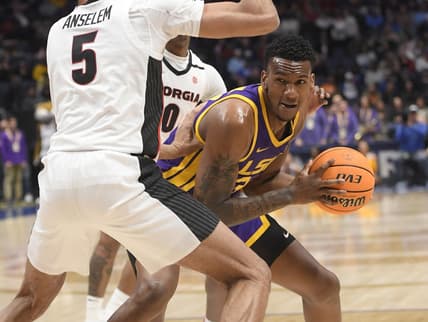 Mar 8, 2023; Nashville, TN, USA;  Georgia Bulldogs center Frank Anselem (5) guards LSU Tigers forward Shawn Phillips (34) during the first half at Bridgestone Arena. Mandatory Credit: Steve Roberts-USA TODAY Sports