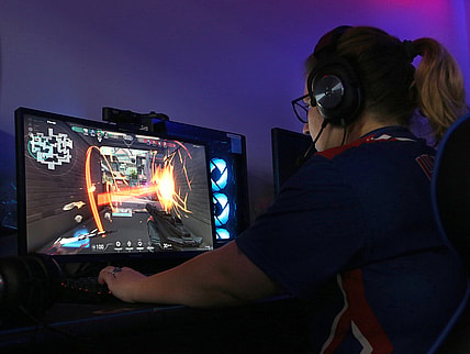 Hutchinson Community College esports team member Christyn Howard plays the game 'Valorant' with her teammates against Shelton State Community College Thursday night, Oct. 7, 2021 at HCC.

Hut 101521 Hcc Esports 09