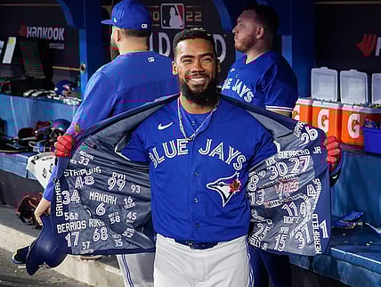Oct 8, 2022; Toronto, Ontario, CAN; Toronto Blue Jays right fielder Teoscar Hernandez (37) celebrates in the dugout after hitting a solo home run in the fourth inning against the Seattle Mariners during game two of the Wild Card series for the 2022 MLB Playoffs at Rogers Centre. Mandatory Credit: John E. Sokolowski-USA TODAY Sports