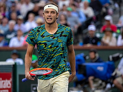 Taylor Fritz of the United States celebrates a point against Jannik Sinner of Italy during their quarterfinal match at the BNP Paribas Open at the Indian Wells Tennis Garden in Indian Wells, Calif., Thursday, March 16, 2023.