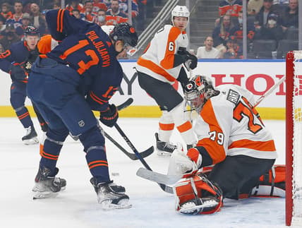 Oct 27, 2021; Edmonton, Alberta, CAN; Philadelphia Flyers goaltender Carter Hart (79) makes a save against Edmonton Oilers forward Jesse Puljujarvi (13) during the first period at Rogers Place. Mandatory Credit: Perry Nelson-USA TODAY Sports