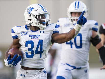 Dec 25, 2021; Montgomery, AL, USA;  Georgia State Panthers safety Antavious Lane (34) returns an interception for a touchdown against Ball State in the camellia Bowl at Cramton Bowl. Mandatory Credit: Mickey Welsh-USA TODAY Sports