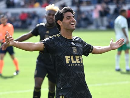 Feb 26, 2022; Los Angeles, California, USA;  Los Angeles FC forward Carlos Vela (10) celebrates with fans after scoring his third goal of the game against the Colorado Rapids at Banc of California Stadium. Mandatory Credit: Jayne Kamin-Oncea-USA TODAY Sports