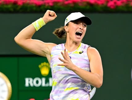Mar 18, 2022; Indian Wells, CA, USA; Iga Swiatek (ITA) hits a shot as she defeated Simona Halep (ROM) in her semifinal match at the BNP Paribas Open at the Indian Wells Tennis Garden. Mandatory Credit: Jayne Kamin-Oncea-USA TODAY Sports