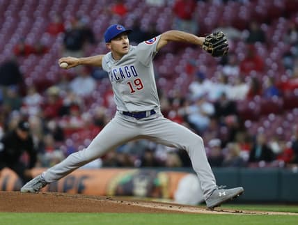 Oct 3, 2022; Cincinnati, Ohio, USA; Chicago Cubs starting pitcher Hayden Wesneski (19) throws a pitch against the Cincinnati Reds during the first inning at Great American Ball Park. Mandatory Credit: David Kohl-USA TODAY Sports
