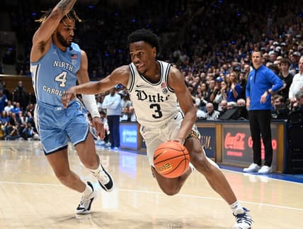Feb 4, 2023; Durham, North Carolina, USA; Duke Blue Devils guard Jeremy Roach (3) drives to the basket against North Carolina Tar Heels guard RJ Davis (4) during the second half at Cameron Indoor Stadium.  The Blue Devils won 63-57. Mandatory Credit: Rob Kinnan-USA TODAY Sports