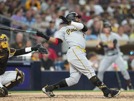 Jul 24, 2023; San Diego, California, USA;  Pittsburgh Pirates first baseman Carlos Santana (41) hits a home run against the San Diego Padres during the fifth inning at Petco Park. Mandatory Credit: Ray Acevedo-USA TODAY Sports