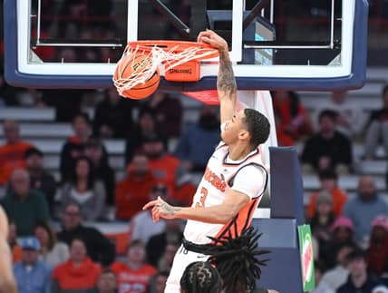 Jan 23, 2024; Syracuse, New York, USA; Syracuse Orange forward Benny Williams (13) dunks the ball against the Florida State Seminoles in the first half at the JMA Wireless Dome. Mandatory Credit: Mark Konezny-USA TODAY Sports