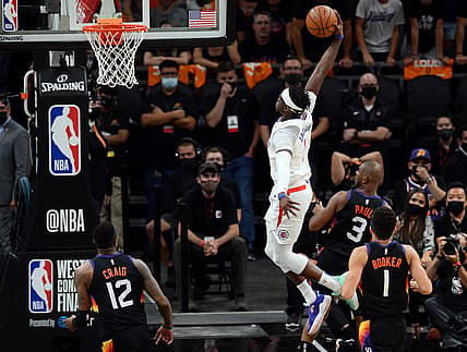 Jun 28, 2021; Phoenix, Arizona, USA; LA Clippers guard Reggie Jackson (1) dunks against the Phoenix Suns during the second half of game five of the Western Conference Finals for the 2021 NBA Playoffs at Phoenix Suns Arena. Mandatory Credit: Joe Camporeale-USA TODAY Sports