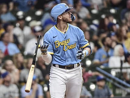Jun 25, 2022; Milwaukee, Wisconsin, USA;  Milwaukee Brewers third baseman Mike Brosseau (20) watches after hitting a solo home run in the third inning during game against the Toronto Blue Jays at American Family Field. Mandatory Credit: Benny Sieu-USA TODAY Sports