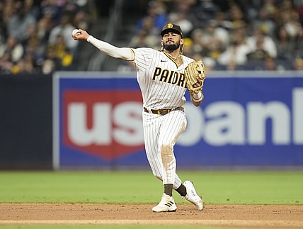Sep 24, 2021; San Diego, California, USA;  San Diego Padres shortstop Fernando Tatis Jr. (23) throws to first base against the Atlanta Braves during the fifth inning at Petco Park. Mandatory Credit: Ray Acevedo-USA TODAY Sports