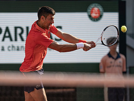Jun 6 2023; Paris,France; Novak Djokovic (SRB) returns a shot during his match against Karen Khachanov on day 10 at Stade Roland-Garros. Mandatory Credit: Susan Mullane-USA TODAY Sports