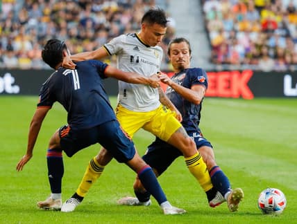 Columbus Crew midfielder Lucas Zelarayan (10) battles past FC Cincinnati forward Yuya Kubo (7) and FC Cincinnati defender Florian Valot (64) during the first half of a MLS match between the Columbus Crew and FC Cincinnati on Friday, Aug. 27, 2021 at Lower.com Field in Columbus, Ohio.

Mls Fc Cincinnati At Columbus Crew