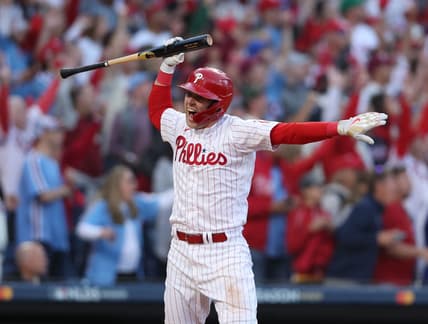 Oct 14, 2022; Philadelphia, Pennsylvania, USA; Philadelphia Phillies first baseman Rhys Hoskins celebrates after hitting a three-run home run against the Atlanta Braves during the 3rd inning in game three of the NLDS for the 2022 MLB Playoffs at Citizens Bank Park. Mandatory Credit: Bill Streicher-USA TODAY Sports