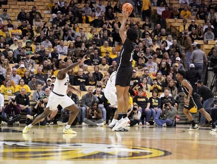 Feb 21, 2023; Columbia, Missouri, USA; Mississippi State Bulldogs forward Will McNair Jr. (13) shoots as Missouri Tigers guard Kobe Brown (24) defends during the first half at Mizzou Arena. Mandatory Credit: Denny Medley-USA TODAY Sports