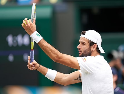 Jul 11, 2021; London, United Kingdom; Matteo Berrettini (ITA) plays against Novak Djokovic (SRB) in the men s final on Centre Court at All England Lawn Tennis and Croquet Club. Mandatory Credit: Peter van den Berg-USA TODAY Sports