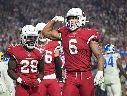 Dec 13, 2021; Glendale, Arizona, USA; Arizona Cardinals running back James Conner (6) celebrates after scoring a rushing touchdown against the Los Angeles Rams during the fourth quarter at State Farm Stadium. Mandatory Credit: Michael Chow-Arizona Republic

Nfl Los Angeles Rams At Arizona Cardinals