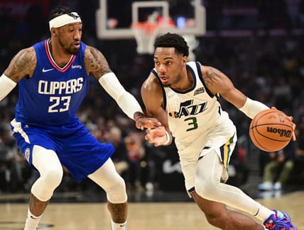 Mar 29, 2022; Los Angeles, California, USA;   Utah Jazz guard Trent Forrest (3) is defended by Los Angeles Clippers forward Robert Covington (23) as he drives to the basket in the first half of the game at Crypto.com Arena. Mandatory Credit: Jayne Kamin-Oncea-USA TODAY Sports